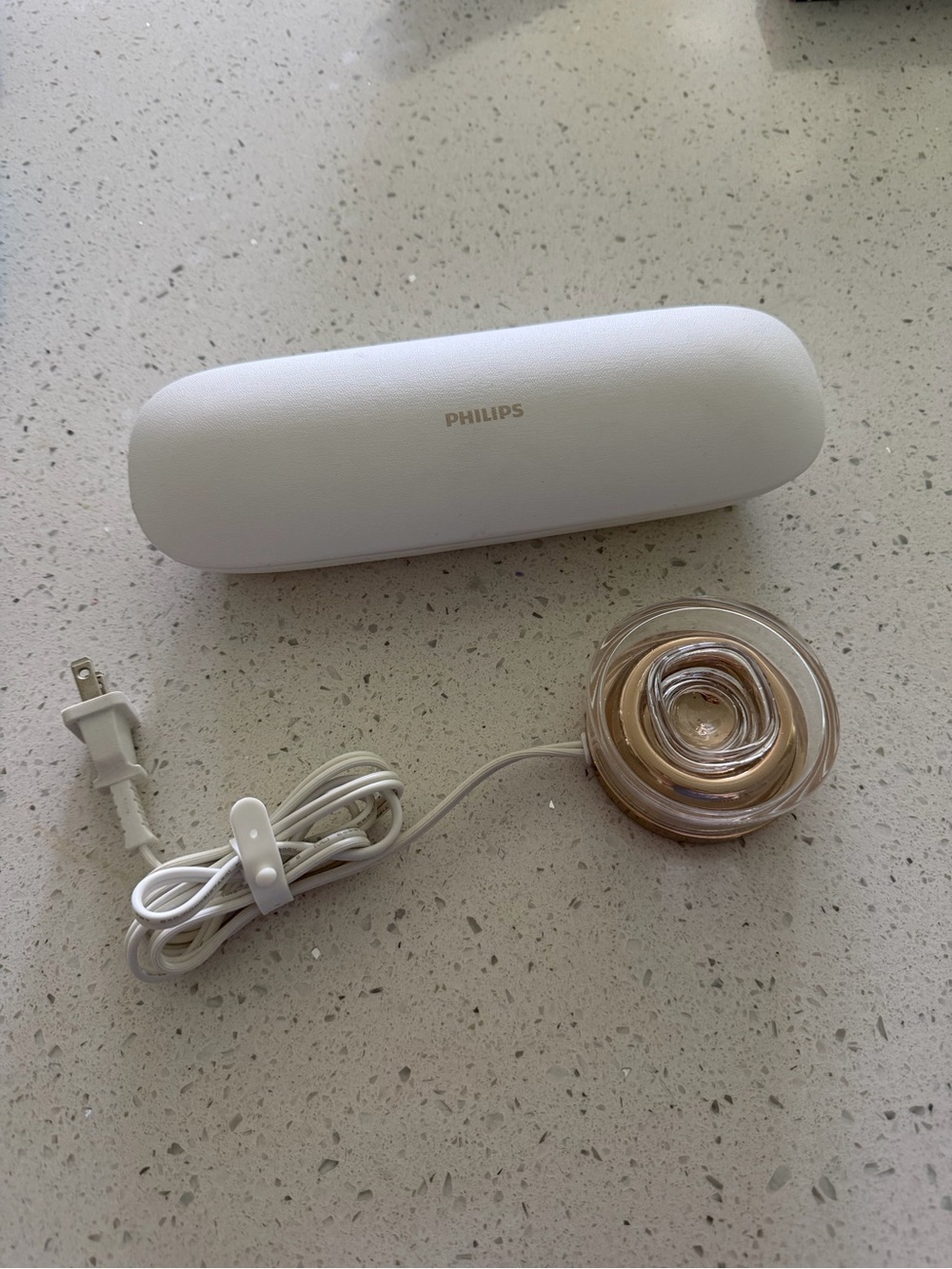 Philips White Portable Device with Amber-Tinted Circular Accessory